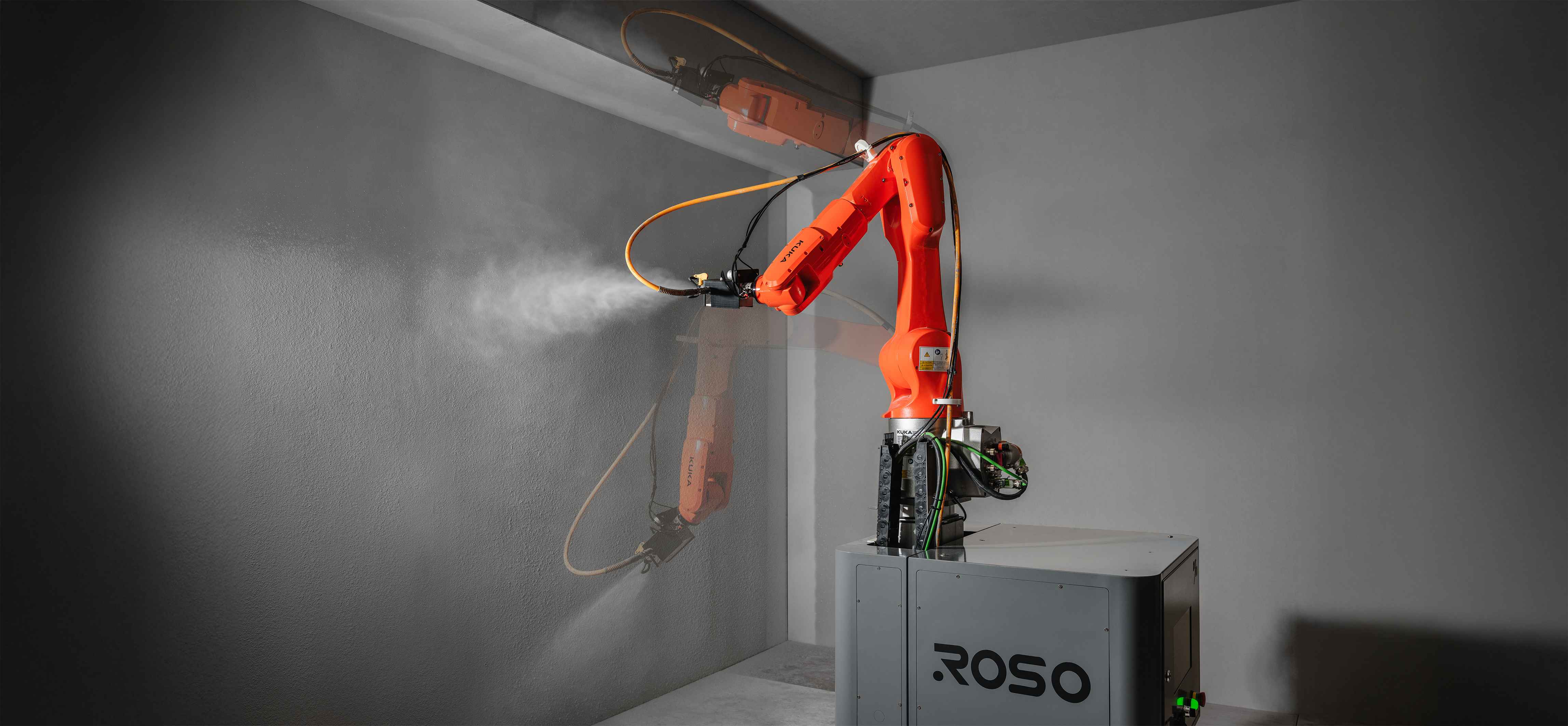 ROSO mobile robotic arm applying material to an interior wall.