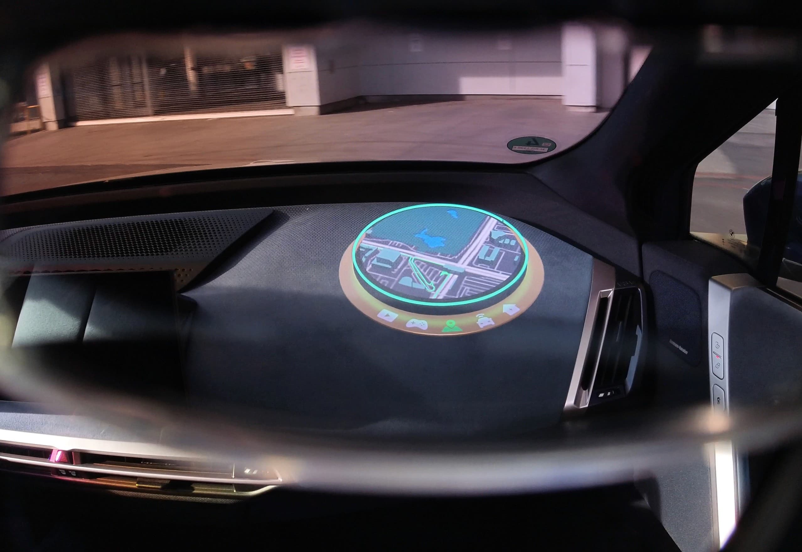 Circular AR map interface projected above the dashboard.
